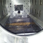 Grill cleaning system of a biomass burner - E&M Combustion